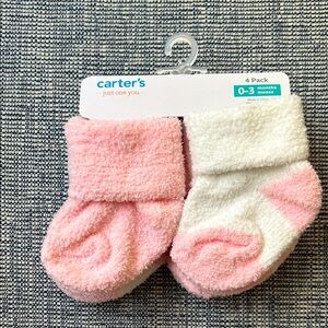 Never used, NEW- Carter's Soft Pink and White Infant Socks - 4 Pack